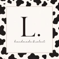 L.