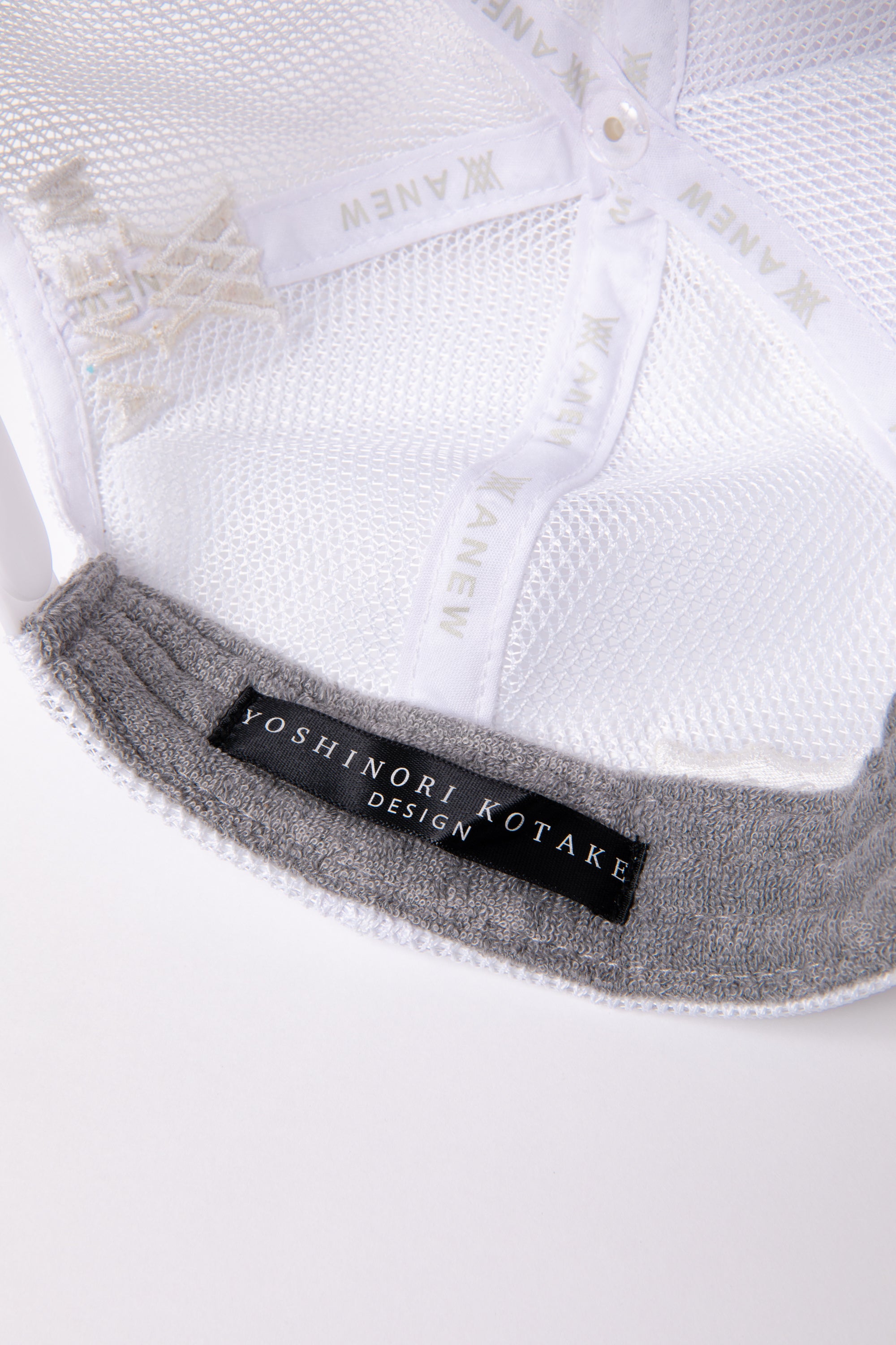 ANEW GOLF UNISEX DAMAGE CAP YOSHINORI KOTAKE DESIGN COLLAB
