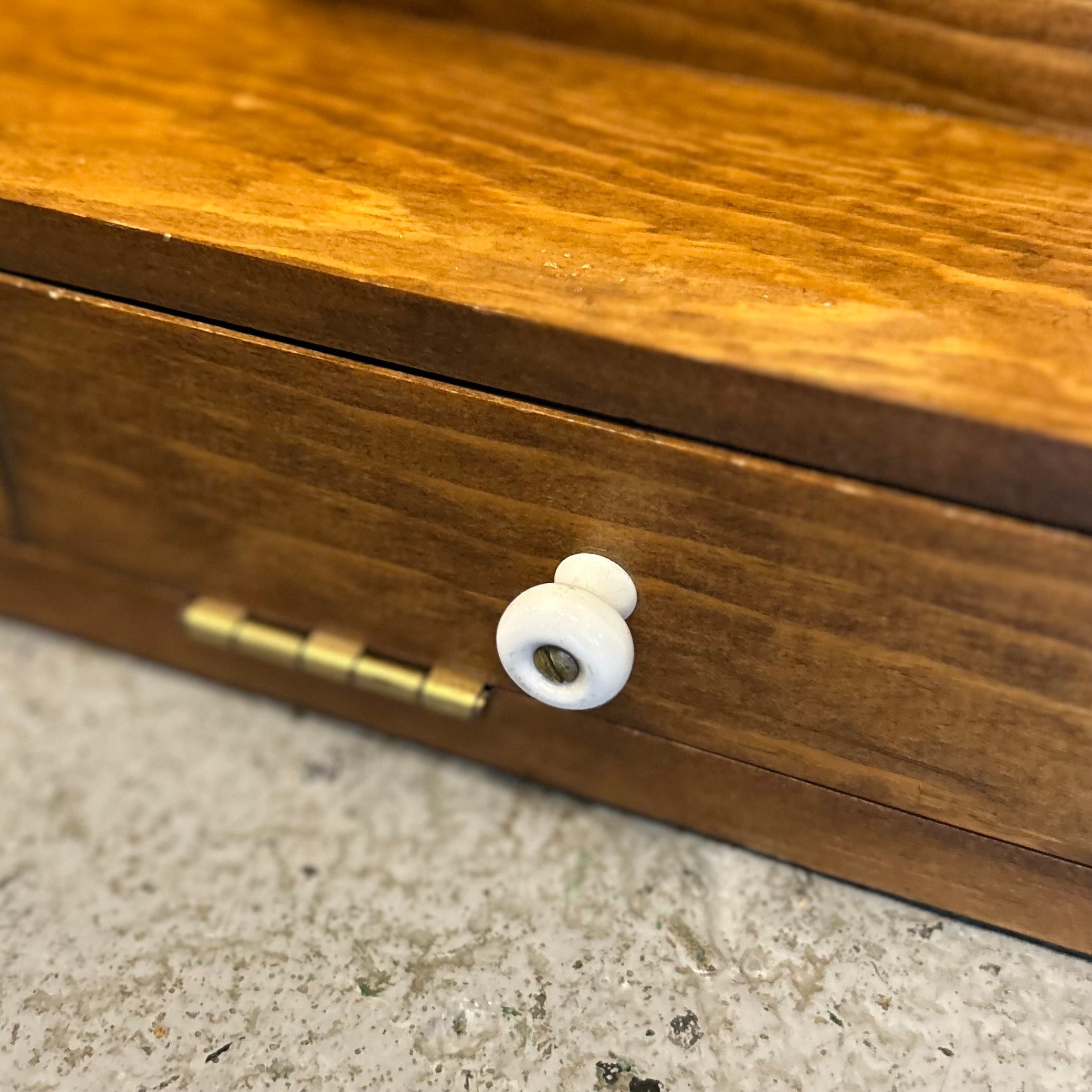 Vintage-Inspired Wooden Display Frame with Hidden Storage Drawer